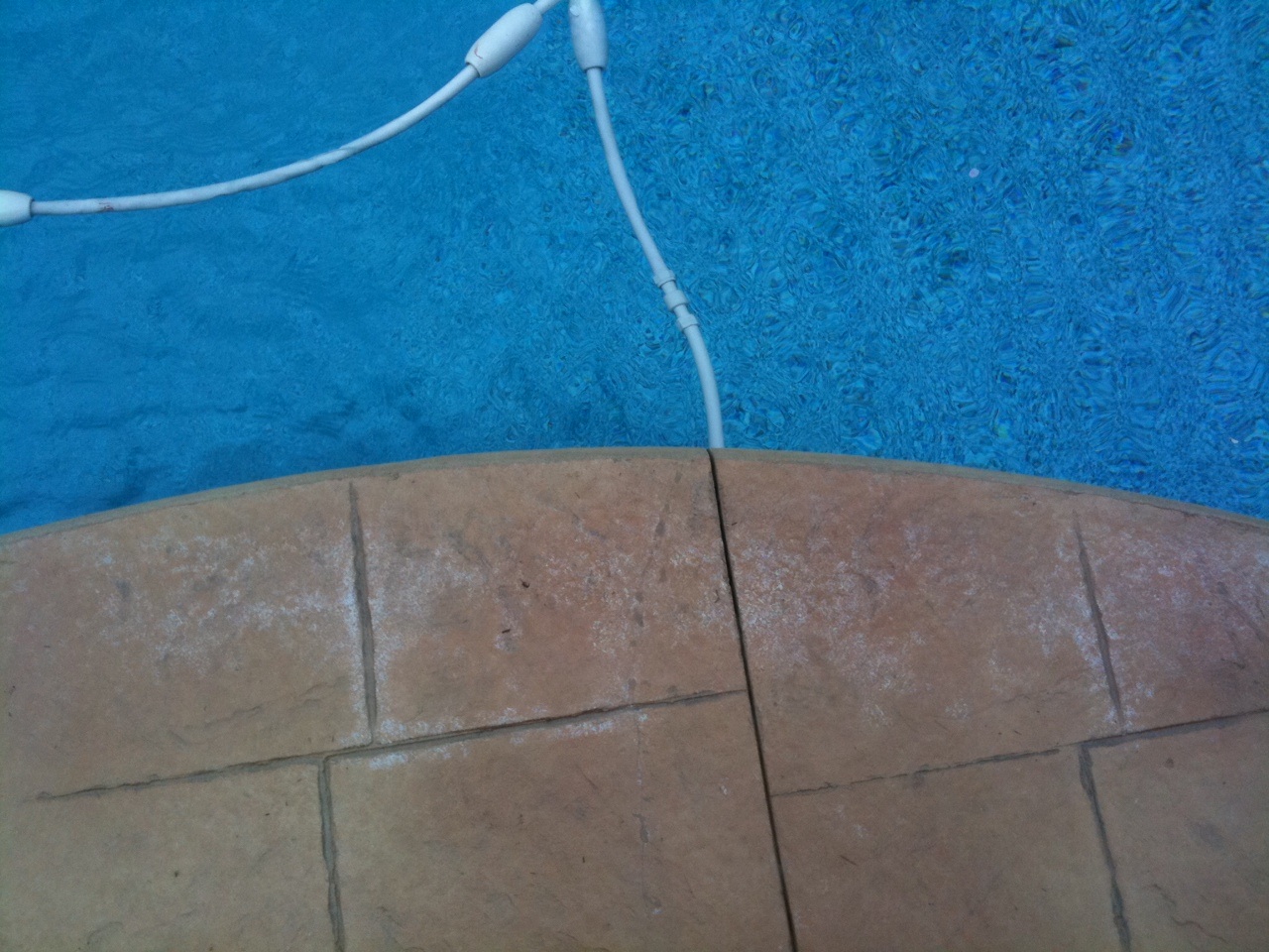 efflorescence on stamped pool deck